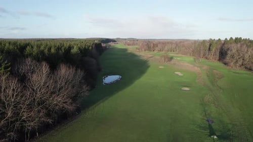Aerial Low Level Drone Flying Over Famous Golf Course - Dolly Shot