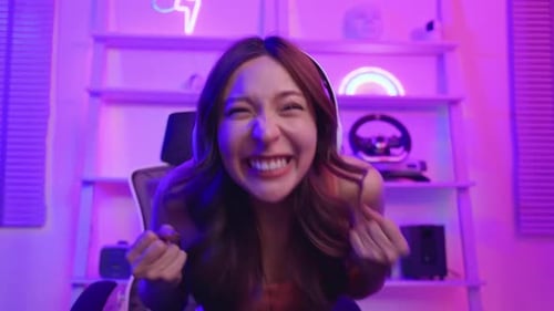 Woman Playing Video Games on Computer