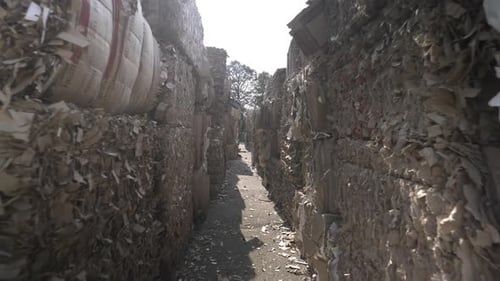 Plant Open Area with Large Waste Paper Bales in Daytime