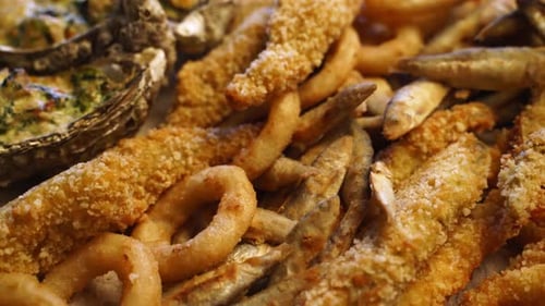 Served Deep Fried Fish Mix Food Set Composition Cook Made Squid Rings Sprat Gobies Oysters on a Tray