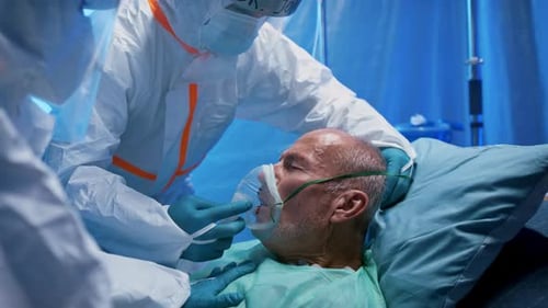 Doctors and Covid-19 Infected Patient in Bed in Hospital, Coronavirus Concept