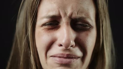 Emotional Woman Crying in Close Up