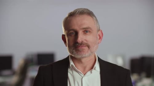 Adult Man In A Blazer Speaking