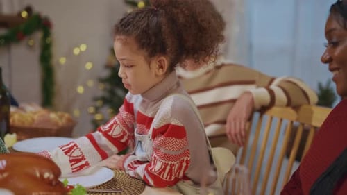 Family Celebrates Christmas Together at Home