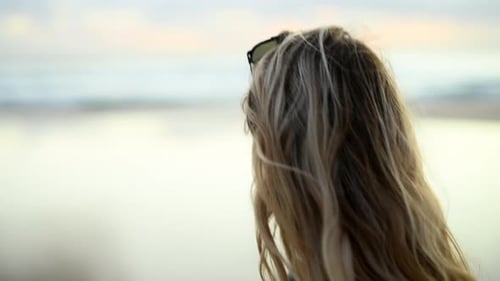 Walking, beach and woman with vacation, nature and outdoor with holiday, travel and adventure