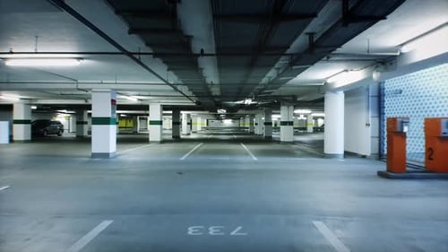 drone footage flying through a empty parking garage in times of corona virus in Europe