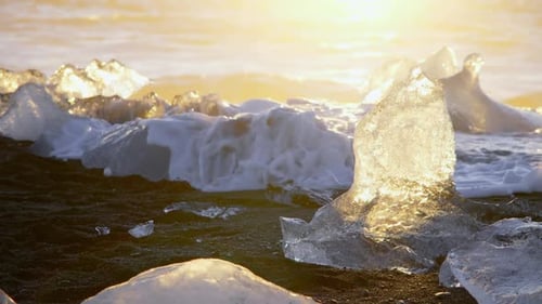 Icebergs At Sunset On Black Volcanic Beach In Iceland Nature