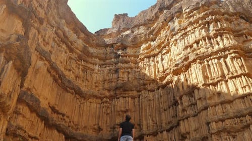 Man Standing on Mountaintop Trail Overlooking Nation Park Wilderness