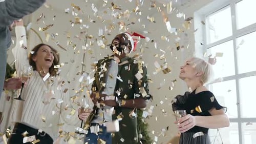 Joyful Friends Celebrate with Confetti and Champagne