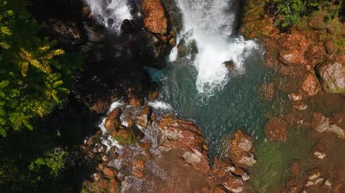 Aerial Top Down View of Waterfall in Forest