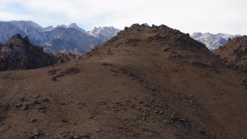 Aerial Over Dry Hillside Of Eastern Sierra. Dolly Back