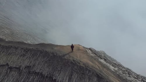 Man Stands Cliff Volcano Drone