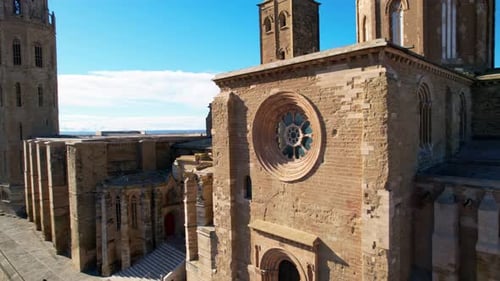 Panoramic aerial drone view of medieval 13th century Cathedral of St Mary of La Seu Vella is symbol