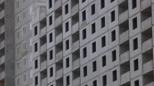 Construction of the high-rise building without windows. Skyscraper under construction.