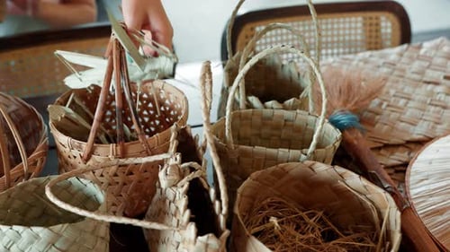 Collection of traditional handmade woven baskets and souvenirs from Khao Lak village in Thailand