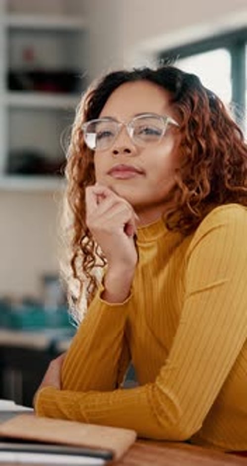 Young Woman Works at Home in Natural Light