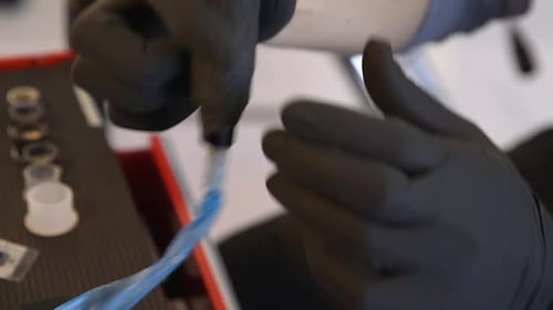 Adjusting Tattoo needle.