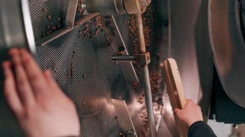 Vertical Video Closeup of a Coffee Roasting Factory Empty Idle Machine Drum with Coffee Residues