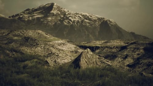 Majestic Mountain Landscape with Rocky Terrain and Soft Grass in Daytime