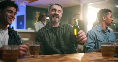 Men, friends and cheers with beer in bar for reunion celebration, appreciation or party event