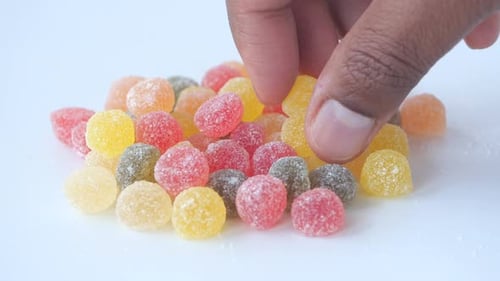 A Vibrant and Colorful Assortment of Delicious Fruit Gummies Displayed on a Clean White Background