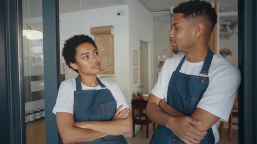 employees working in a nordic styled cafe.