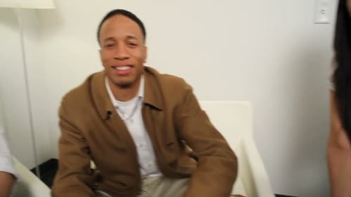 Smiling People Sitting Indoors in a Group