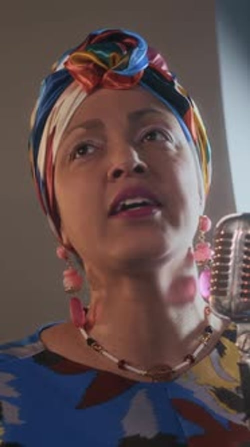 Woman Singing Passionately into Vintage Microphone