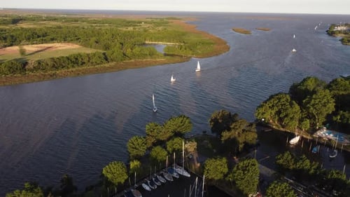 Sailboats navigating along maritime route between Buenos Aires in Argentina and Montevideo in Urugua