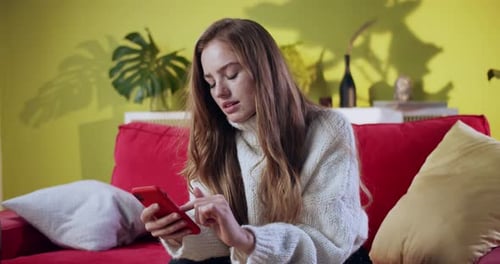 Excited Woman Reacting to Good News on Phone