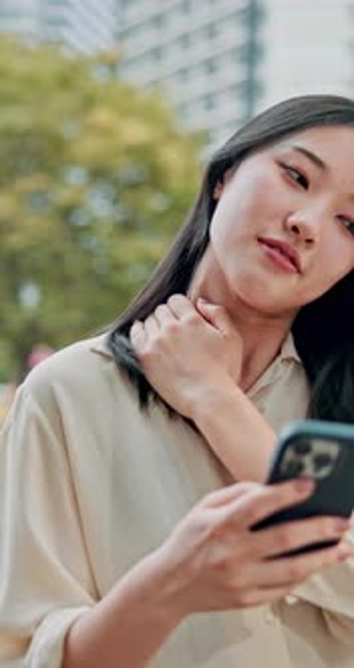 City, business woman and phone with shoulder pain for stress, bad news and app with notification