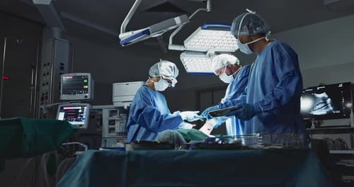 Doctors, team and surgery in theater with medical support for healthcare
