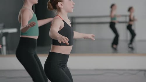 Girls Practice Tap Dancing in Dance Studio