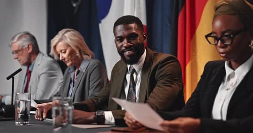 Four Adults at a Corporate Meeting