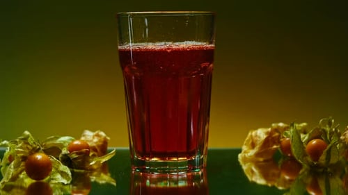 Close Up Glass of Dark Red Beverage