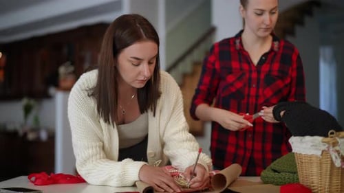 Young Women Doing Arts and Crafts at Home