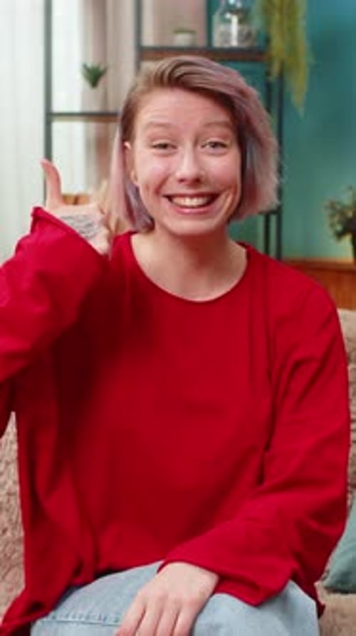 Young Woman Showing Thumbs Up Gesture Positive Approval Agreement Good Feedback Smiling Cheerfully