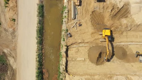 Heavy machinery works of a motorway - Highway Construction. Aerial View