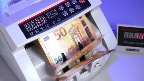 Financial Money Currency Counting Machine Close up of euro banknotes while counting.