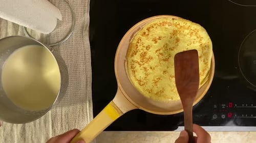 Pancake Cooking in Pan, Top Down View