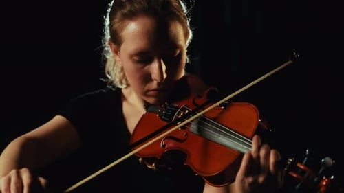 Woman Playing Violin in Close Up Shot