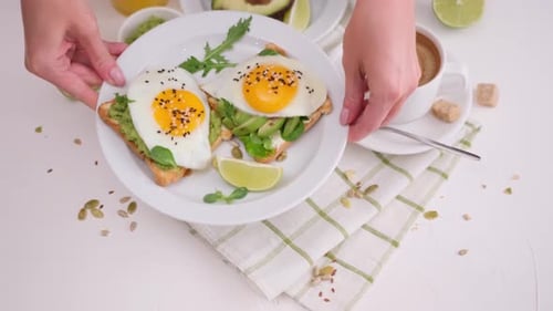 Breakfast scene with avocado toast and coffee