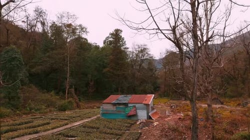 Remote Mountain Landscape with Isolated Steel Shack