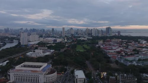 Aerial Panoramic View of Large City at Dusk Park and Buildings in Metropolis High Rise Office or