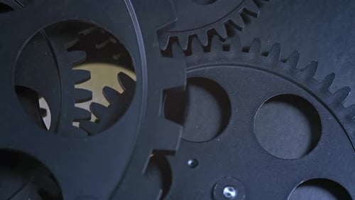 Rotating Mechanical Gears in a Dark Frame