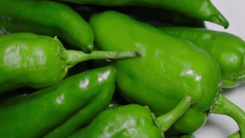 Closeup Pan Left of Green Anaheim Peppers, Directly Above
