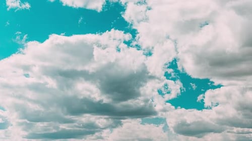 Cloudy Sky With Fluffy Clouds