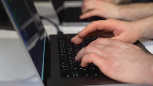 Programmers working together in a team
