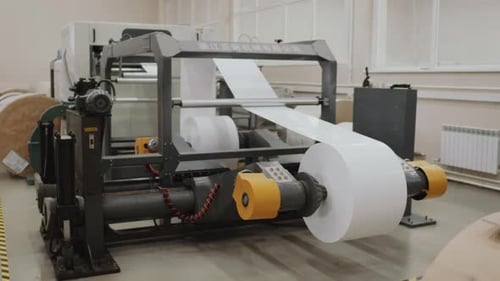 Industrial Paper Roll Cutting Machine in Operation