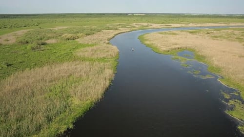 Aerial View of Bog Lands Near the River Valley